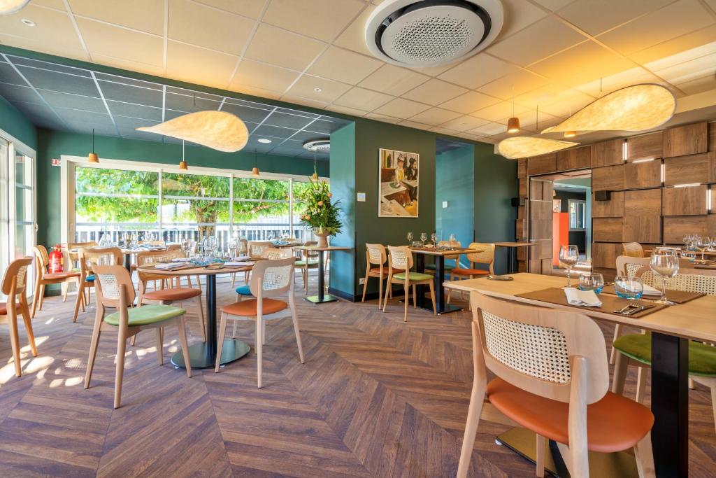 Restaurace v ubytování Hôtel Restaurant Le Relais des Gourmands