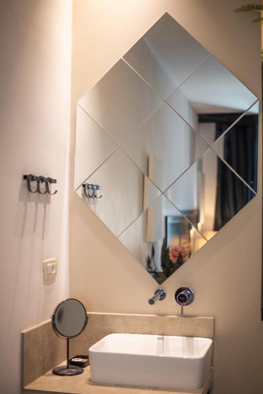 A bathroom at Emporikon Athens Hotel
