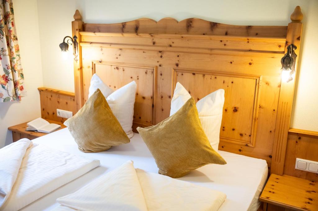 Voodi või voodid majutusasutuse Naturhotel Hüttenwirt im Grossarltal toas