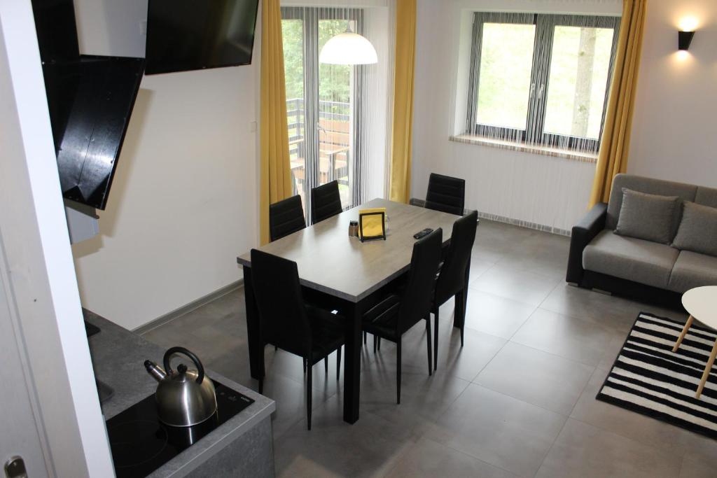 Posedenie v ubytovaní Apartamenty Świstak Maciej Dunajczan