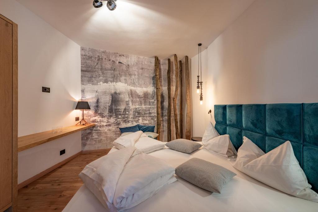 Postel nebo postele na pokoji v ubytování Hotel Goldene Traube
