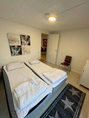 Postel nebo postele na pokoji v ubytování Båstad