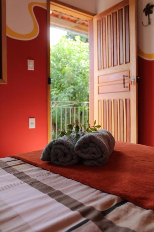 Postel nebo postele na pokoji v ubytování Chapada Backpackers Hostel Agência
