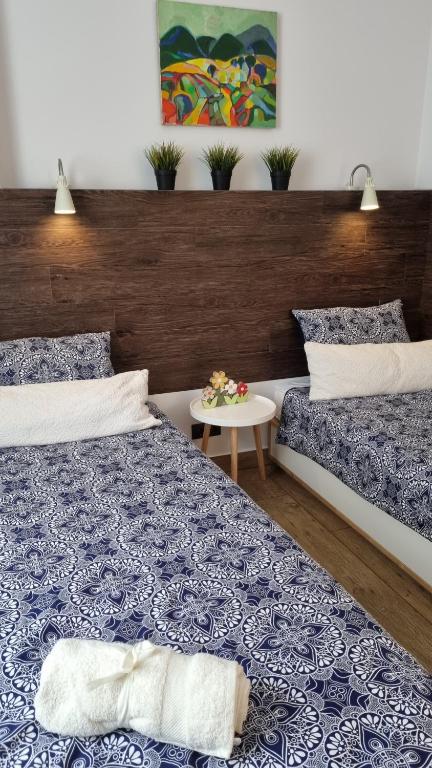 Postel nebo postele na pokoji v ubytování Old Town City Center Apartment