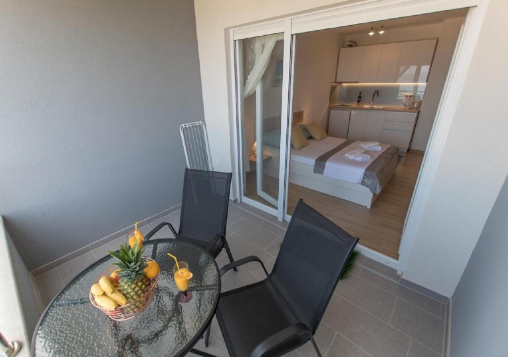 Postel nebo postele na pokoji v ubytování Seaview apartments Oscar