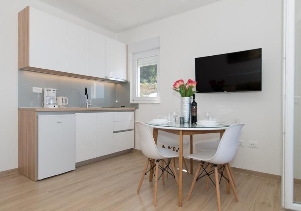 Kuchyň nebo kuchyňský kout v ubytování Seaview apartments Oscar