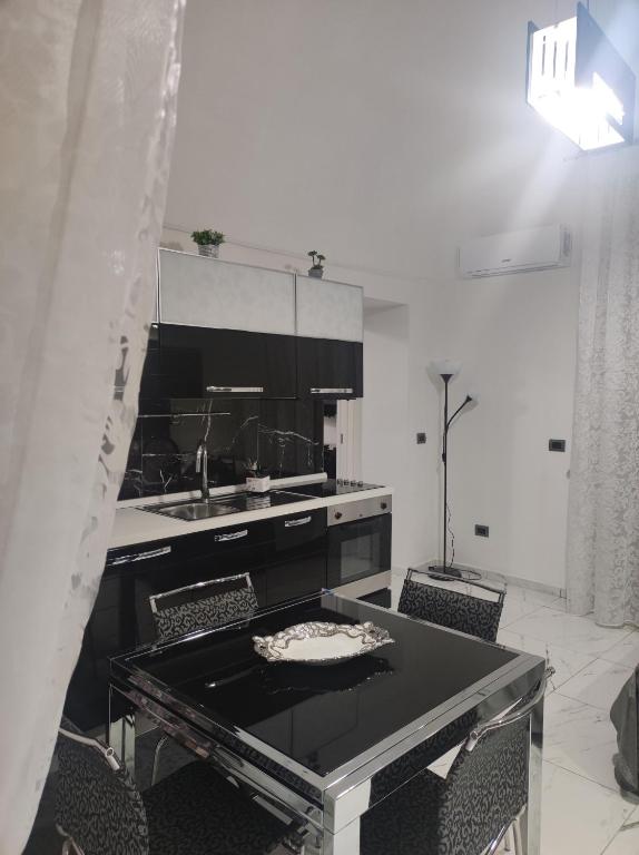 Kuchyňa alebo kuchynka v ubytovaní La casa di Titina