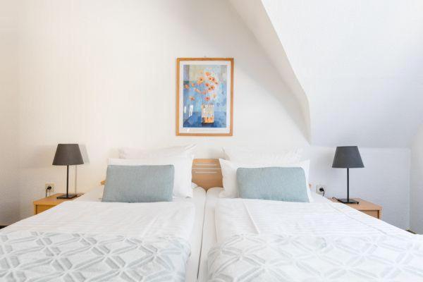 Ένα ή περισσότερα κρεβάτια σε δωμάτιο στο Landhaus Sonnenhang