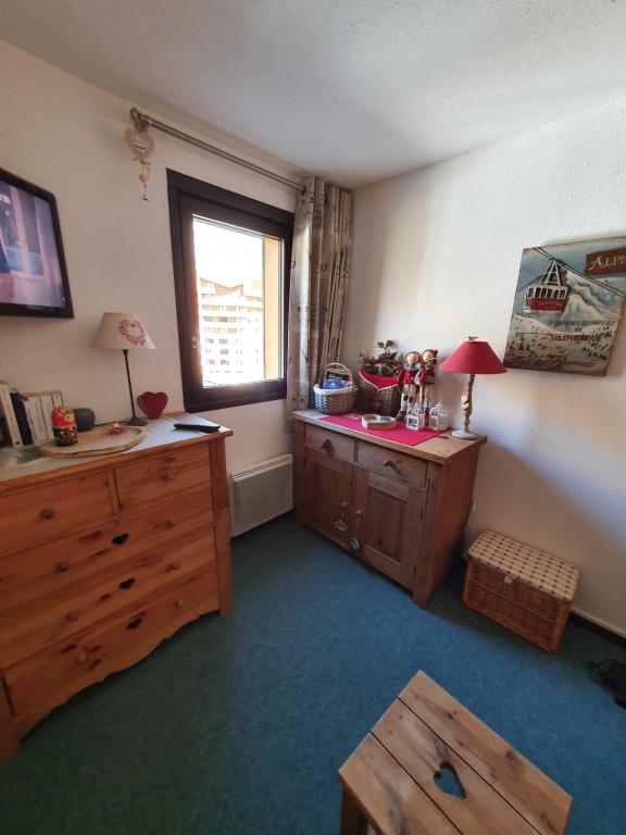 Postel nebo postele na pokoji v ubytování 2 pièce cabine Val Thorens