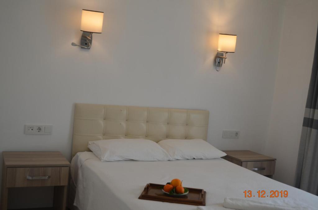 Postel nebo postele na pokoji v ubytování Hotel Uygar