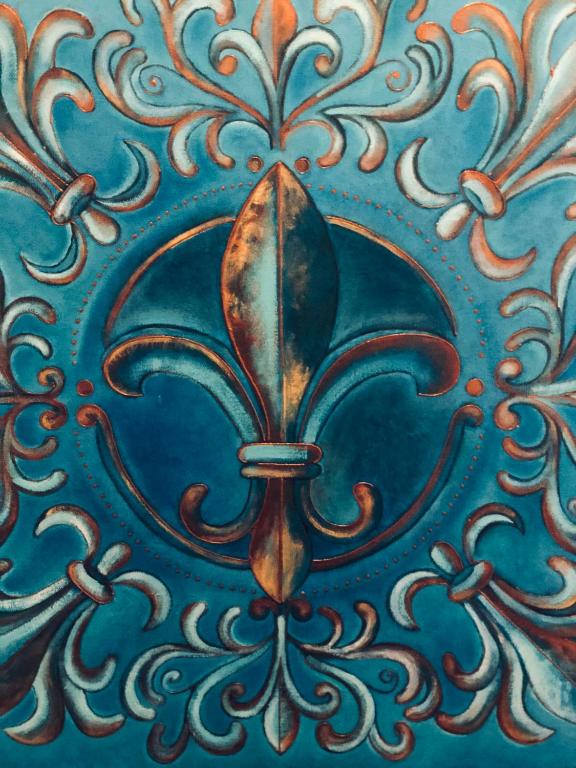a painting of a blue wall with a spoon at Suites D'Elice in El Palmar