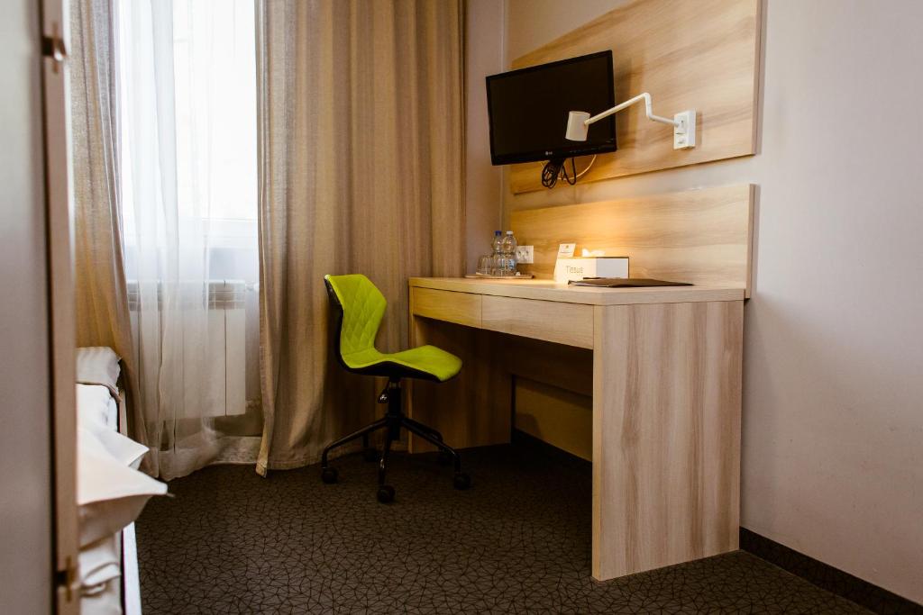 TV a/nebo společenská místnost v ubytování Mohito Bed&Breakfast