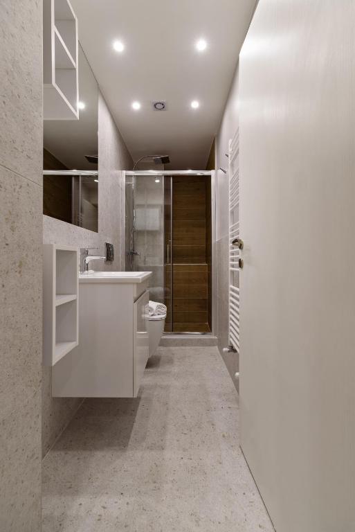 Kuchyň nebo kuchyňský kout v ubytování Blu & Marrone Suites-parking included