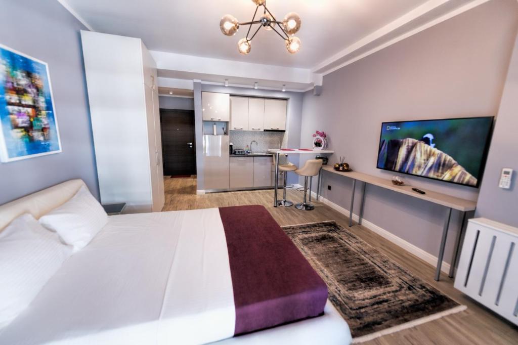 Katil atau katil-katil dalam bilik di Miros De Vacanță