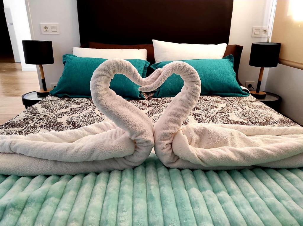 Postel nebo postele na pokoji v ubytování El Rodeno de Gea Ideal parejas