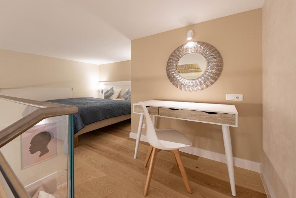 A bed or beds in a room at Ozone One Apartment
