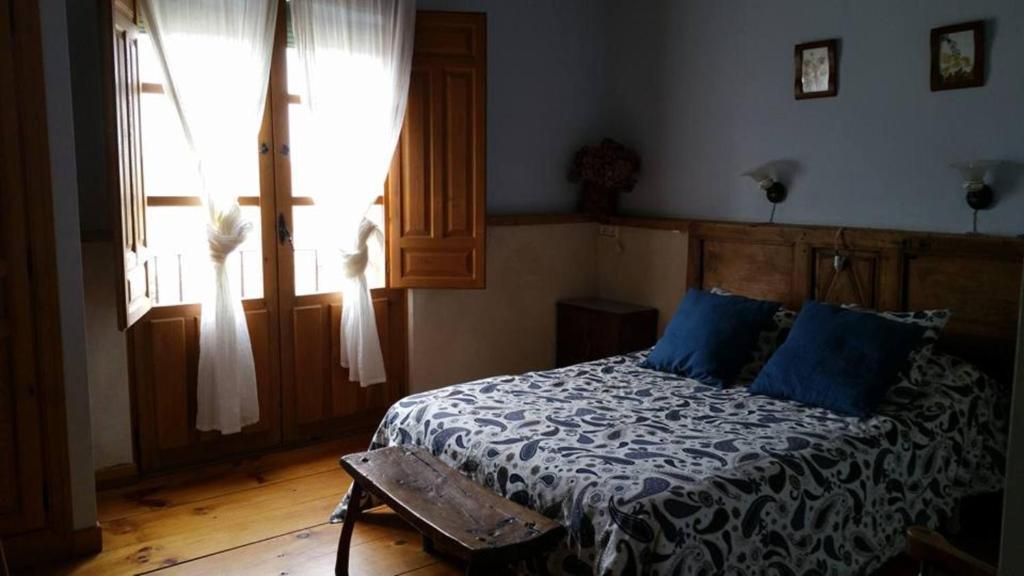 Posteľ alebo postele v izbe v ubytovaní El Camino Real