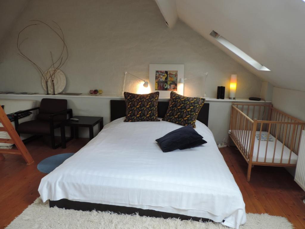 Postel nebo postele na pokoji v ubytování B&B Lodging At 8