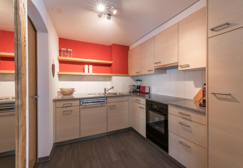 Kuchyň nebo kuchyňský kout v ubytování Les Residences Waldbort