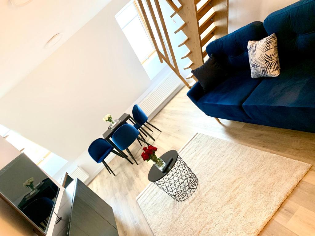Гостиная зона в Apartament w samym sercu miasta z DARMOWYM PARKINGIEM Pod Złotym Lwem -hotel VI