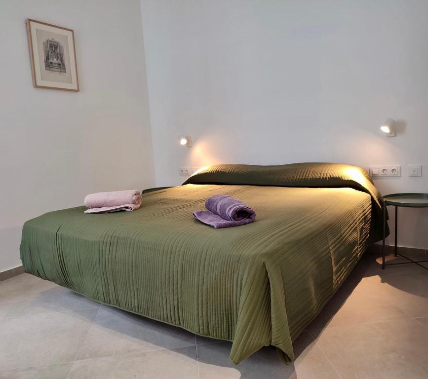 Postel nebo postele na pokoji v ubytování Covadonga 9 Apartments - Triana