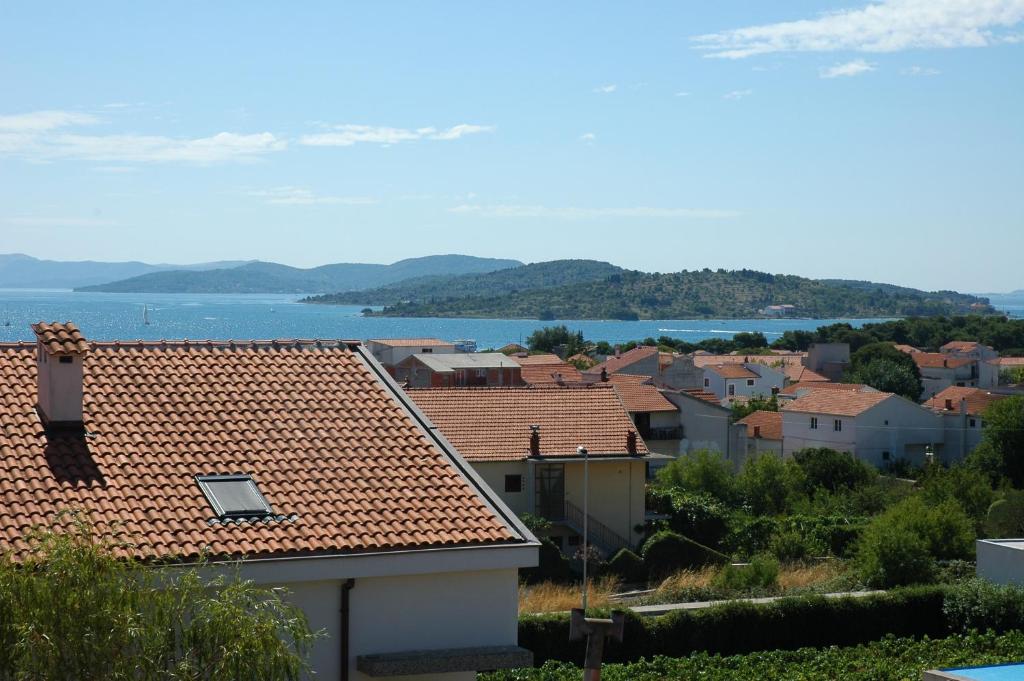 a view of a town with a river and houses at Apartment Latinovic in Vodice