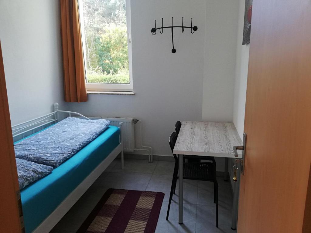Postel nebo postele na pokoji v ubytování The Hostel