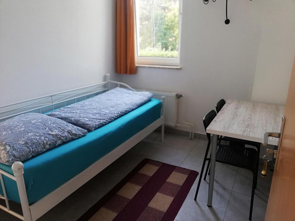Postel nebo postele na pokoji v ubytování The Hostel