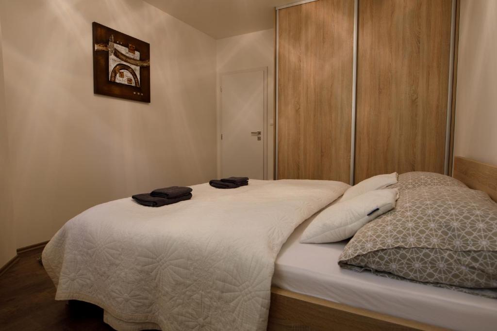 Postel nebo postele na pokoji v ubytování apartmán ADAM Bystrá Tále