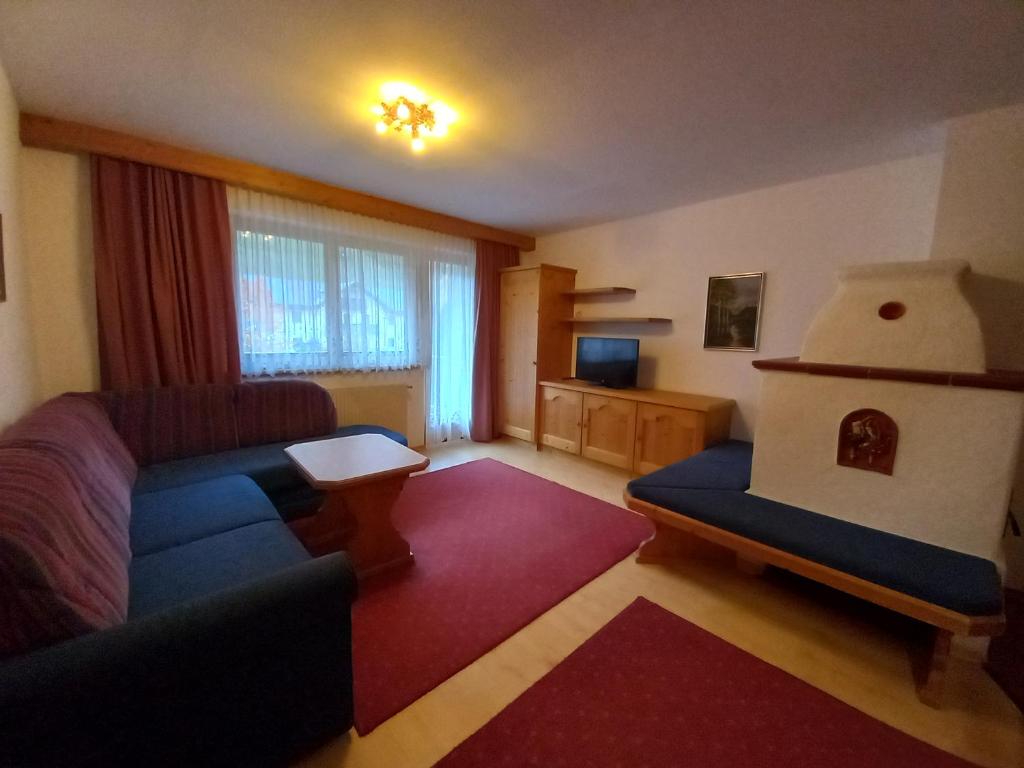 Posteľ alebo postele v izbe v ubytovaní Aparthaus Camping Stubai