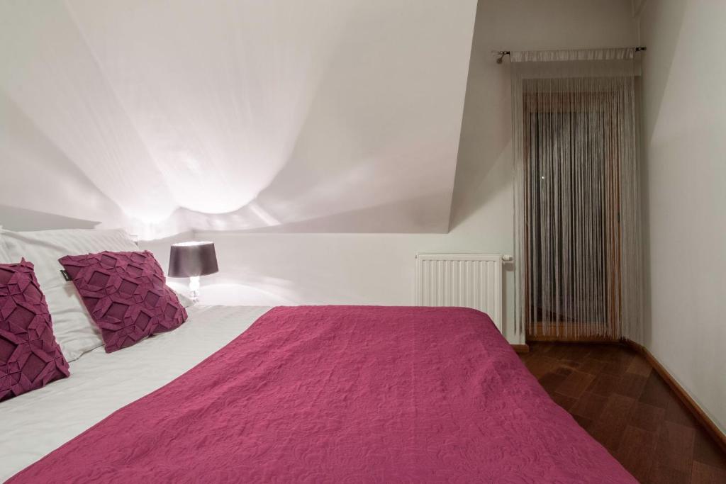 Posteľ alebo postele v izbe v ubytovaní ApartSerwis - Gorące Źródła Apartament Lodowa Kopa 1