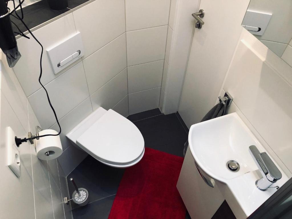 Koupelna v ubytování Bungalow am Stadtwald, 24h Check-in