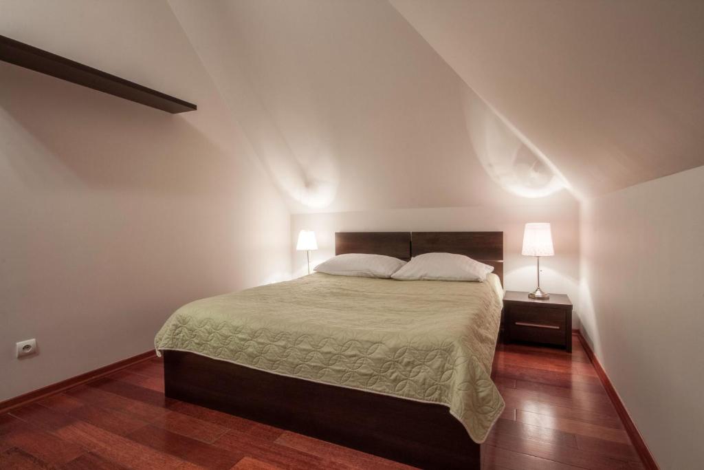 Posteľ alebo postele v izbe v ubytovaní ApartSerwis - Gorące Źródła Apartament Szałasówka
