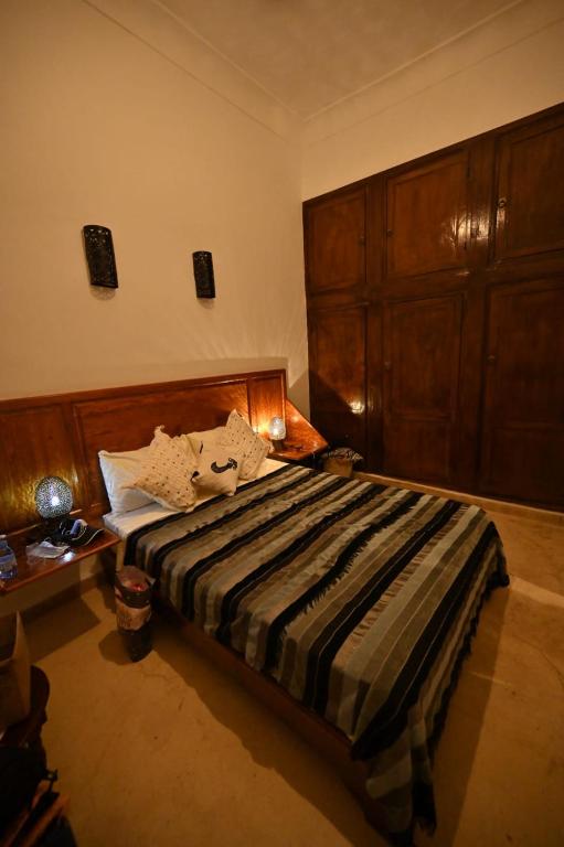 Postel nebo postele na pokoji v ubytování Riad Thycas