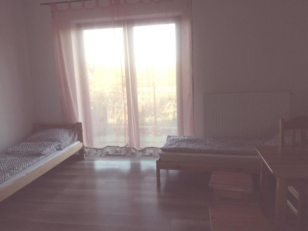 Noclegi Pod Dębem - Quadruple Room With Bathroom