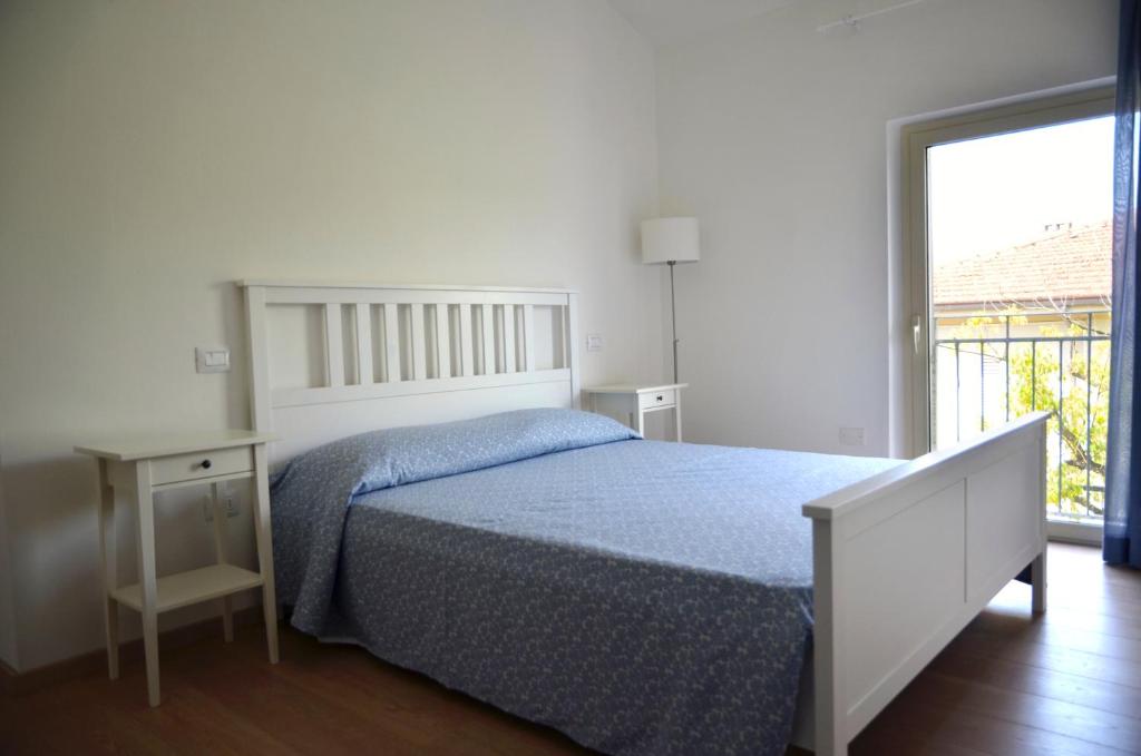 Postel nebo postele na pokoji v ubytování Petit Hotel