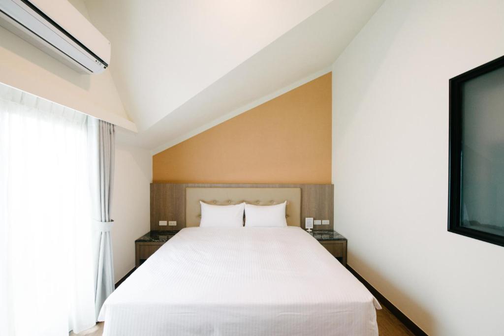 Postel nebo postele na pokoji v ubytování The Stay Inn