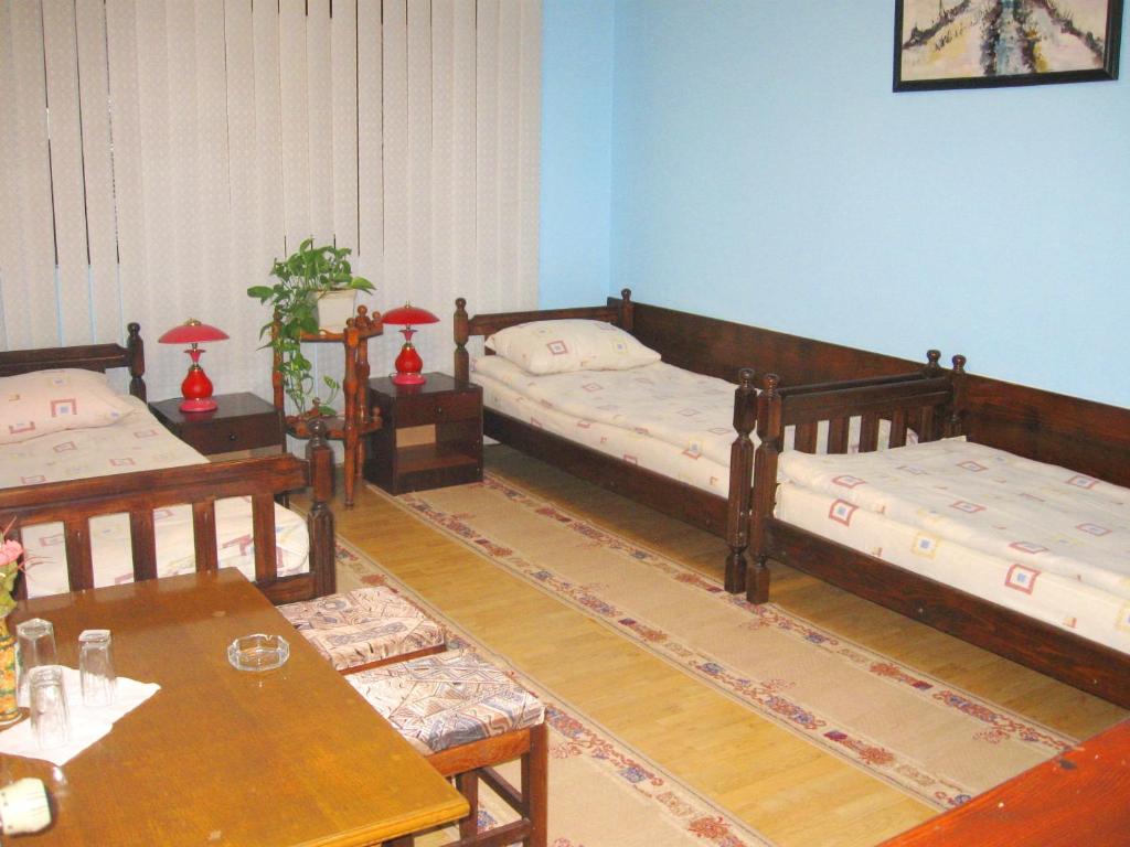 Voodi või voodid majutusasutuse Amfora Rooms Caribrod toas