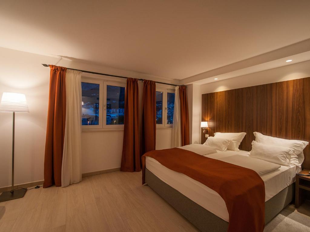 Posteľ alebo postele v izbe v ubytovaní Aparthotel Miramare