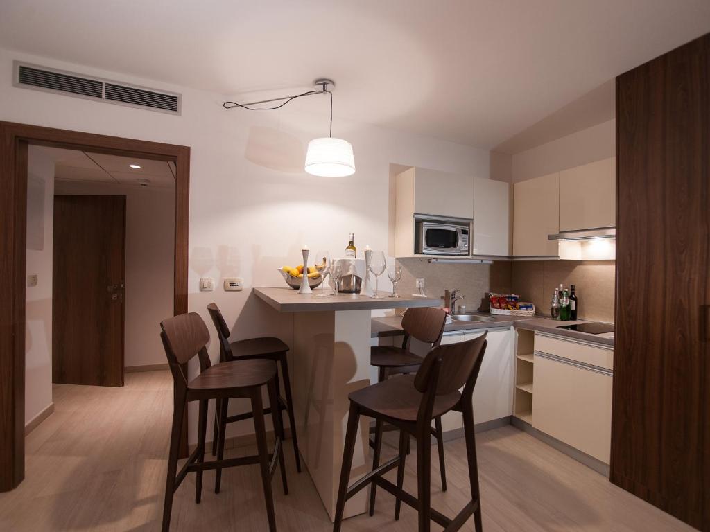 Kuchyňa alebo kuchynka v ubytovaní Aparthotel Miramare