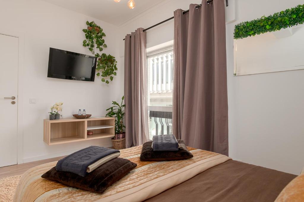 Postel nebo postele na pokoji v ubytování Avenue View Rooms - Guest House