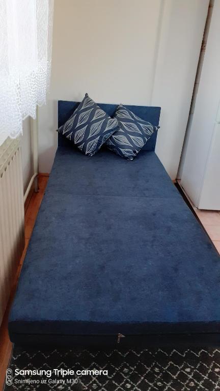 Postel nebo postele na pokoji v ubytování Apartman 19