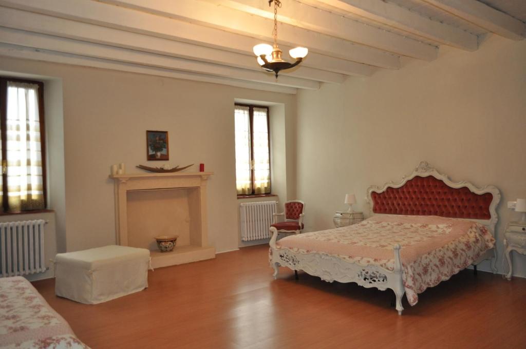 Ένα ή περισσότερα κρεβάτια σε δωμάτιο στο Casa San Martino