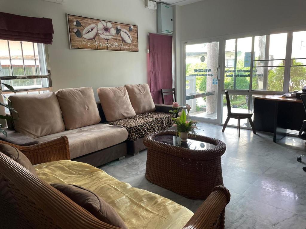 Posezení v ubytování Kasemsuk Guesthouse SHA Extra plus