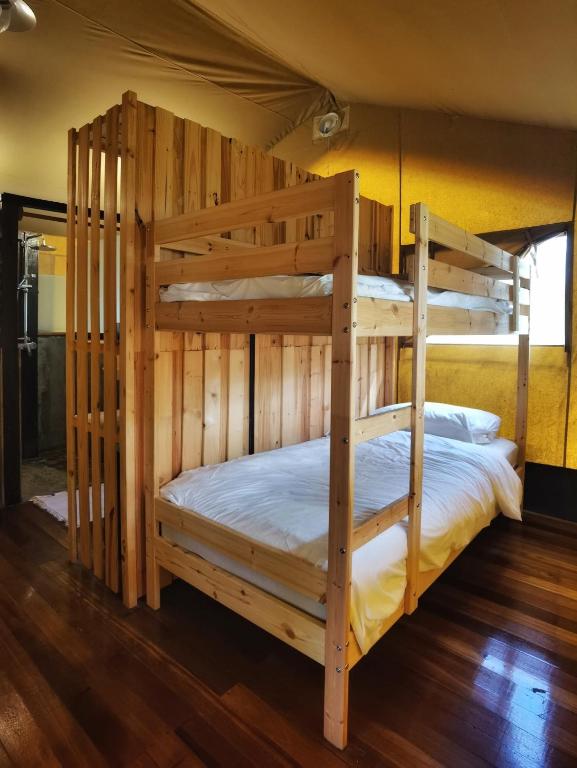 Postel nebo postele na pokoji v ubytování Ara Dinawan Island Resort