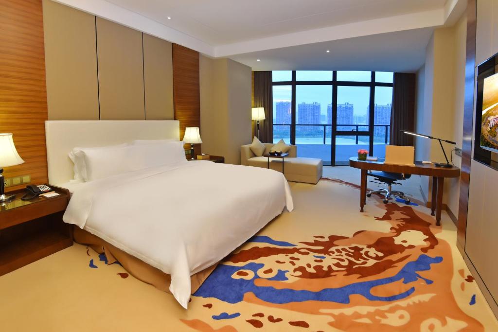 TV a/nebo společenská místnost v ubytování Grand Skylight International Hotel Huizhou