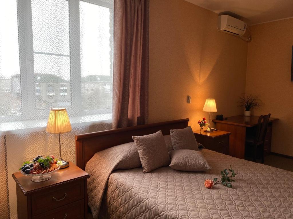 Cama o camas de una habitación en Ural Hotel