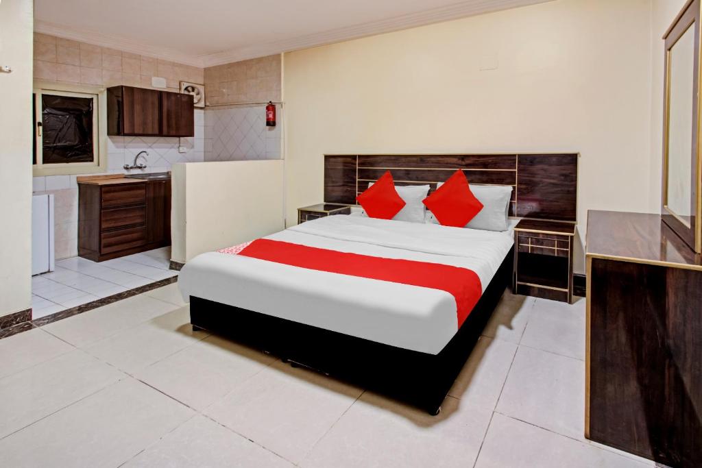 เตียงในห้องที่ أويو 590 ديالا للوحدات السكنية