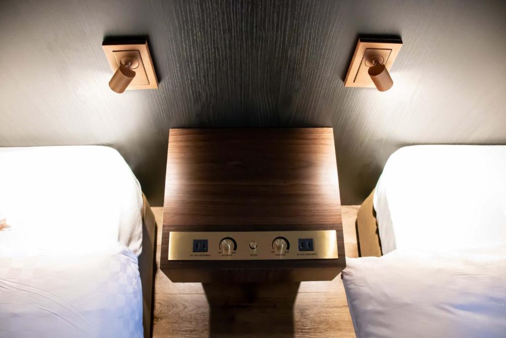 Postel nebo postele na pokoji v ubytování Hotel S-Presso South