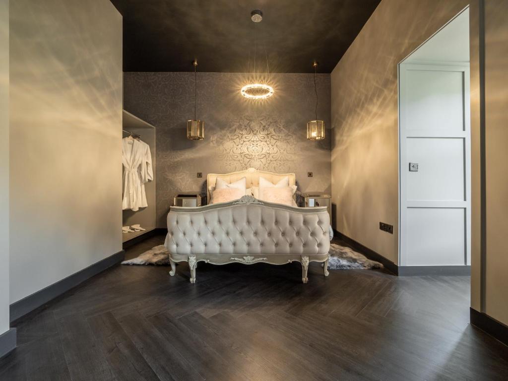 Postel nebo postele na pokoji v ubytování Bowers Mill Aparthotel